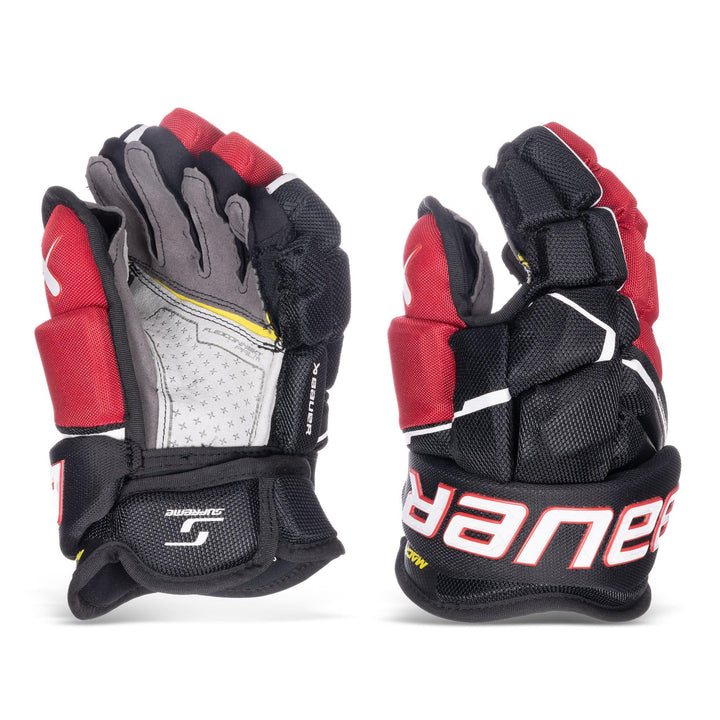 https://www.thehockeyshop.com/cdn/shop/files/bauer-gloves-bauer-supreme-mach-junior-hockey-gloves-black-red-10-30597294161986_720x.jpg?v=1768105611