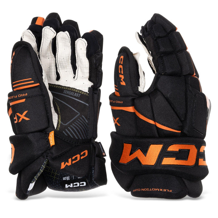 https://www.thehockeyshop.com/cdn/shop/files/ccm-gloves-ccm-tacks-xf-senior-hockey-gloves-black-orange-13-31801575538754_720x.jpg?v=1768136182
