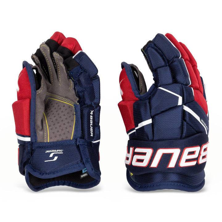 https://www.thehockeyshop.com/cdn/shop/files/bauer-gloves-bauer-supreme-m5-pro-junior-hockey-gloves-navy-red-white-11-30400471400514_720x.jpg?v=1768105708