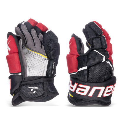 https://www.thehockeyshop.com/cdn/shop/files/bauer-gloves-bauer-supreme-mach-junior-hockey-gloves-black-red-10-30597294161986_720x.jpg?v=1768105611