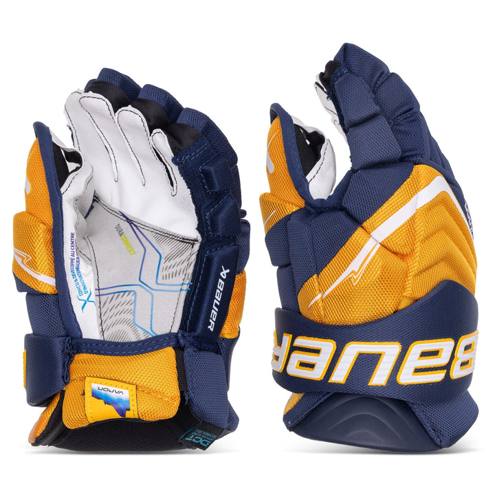 https://www.thehockeyshop.com/cdn/shop/files/bauer-gloves-bauer-vapor-flylite-intermediate-hockey-gloves-navy-gold-12-1174744559_720x.jpg?v=1750707328