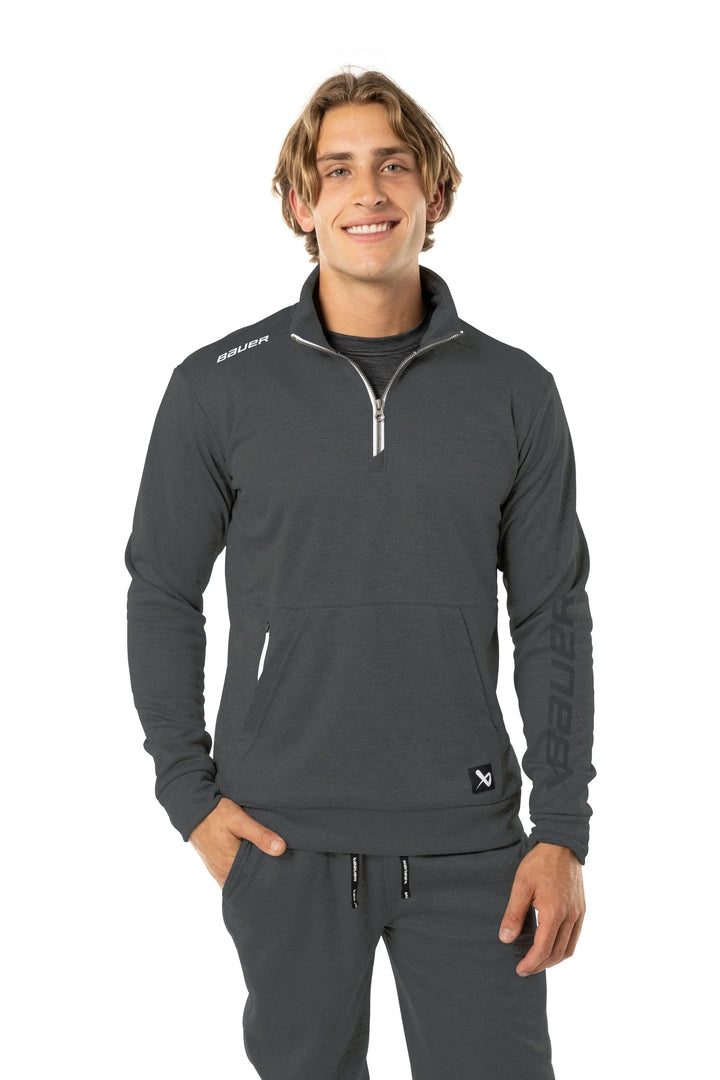 https://www.thehockeyshop.com/cdn/shop/files/bauer-hoodies-s23-bauer-team-fleece-senior-1-2-zip-grey-xs-30850395799618_720x.jpg?v=1768108705