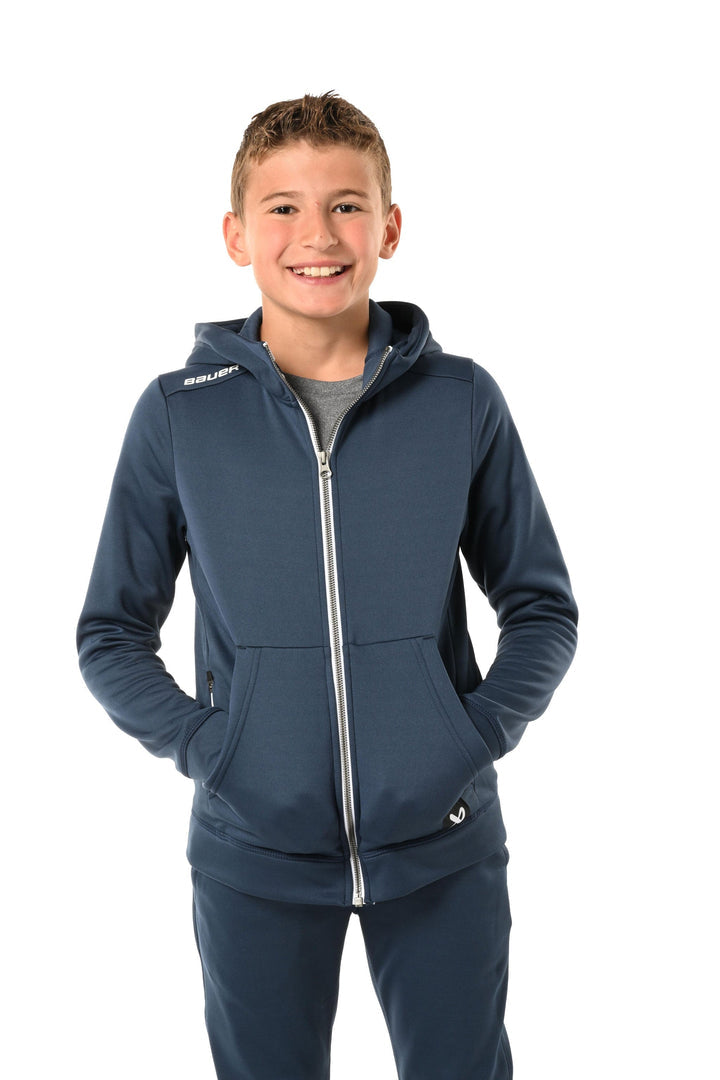 https://www.thehockeyshop.com/cdn/shop/files/bauer-hoodies-s23-bauer-team-fleece-youth-zip-hoody-navy-xxs-30850492399682_720x.jpg?v=1698424722