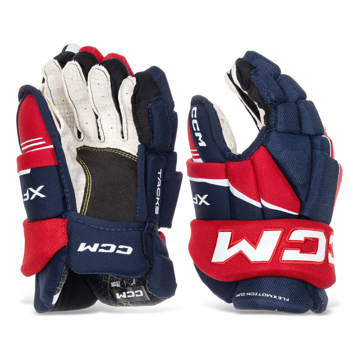 https://www.thehockeyshop.com/cdn/shop/files/ccm-gloves-ccm-tacks-xf80-junior-hockey-gloves-navy-red-white-10-31801545424962_720x.jpg?v=1718651275